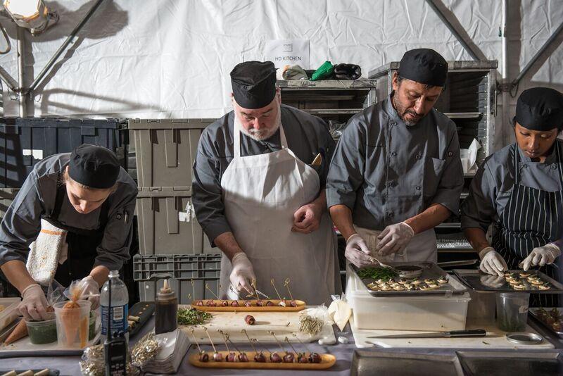 The Starr Catering team prepares their next course. Photo by Jennifer May 