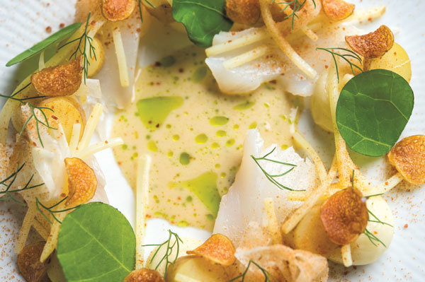 A sampling of cuisine from Claus Meyer's Agern: Cod with potatoes, fennel, and nasturtium (photo by Evan Sung)