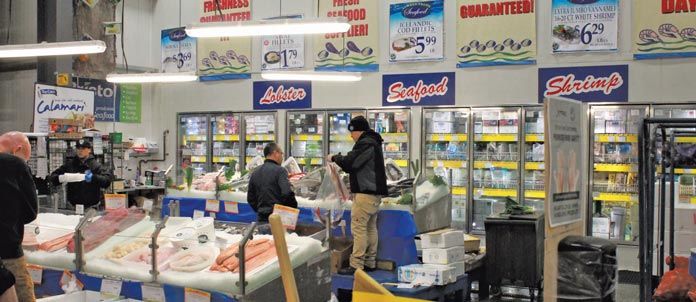 The teachers toured Jetro/Restaurant Depot's facility, including a massive seafood section that includes fresh and frozen options.