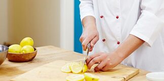 kitchen chef cutting lemons operations