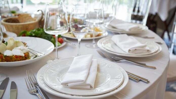 restaurant plates utensils table hurting