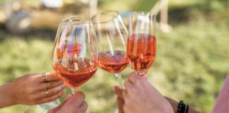 spring beverage industry clinking wine glasses