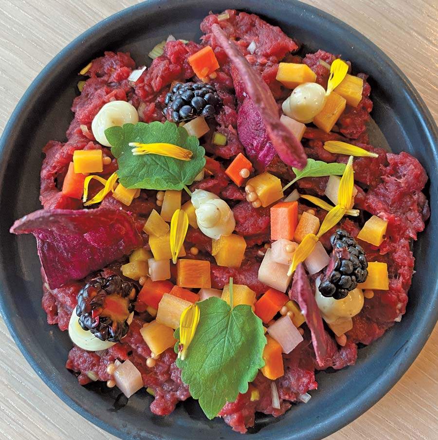 The Owamni menu prioritizes purchasing from Indigenous food producers locally and nationally. They have removed colonial ingredients such as wheat flour, cane sugar and dairy to present a decolonized dining experience. Menu items include the venison tartare (Photo by Dana Thompson)