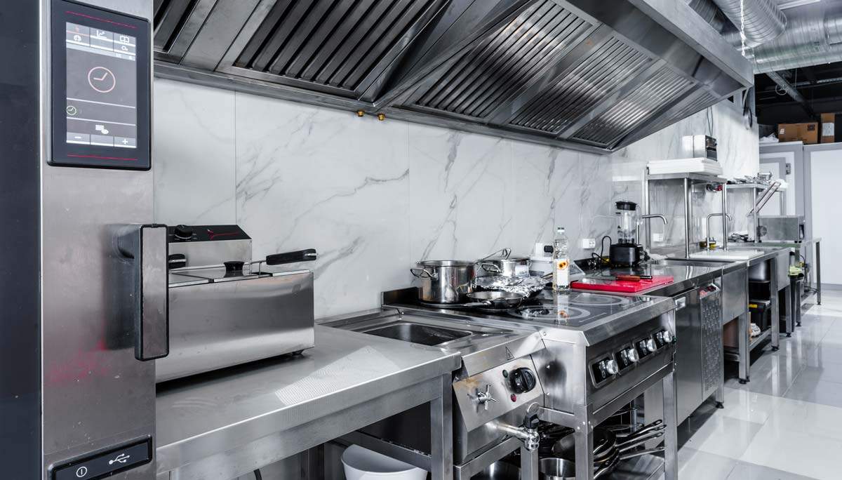https://totalfood.com/wp-content/uploads/2022/11/restaurant-equipment-professional-kitchen-2-1.jpg