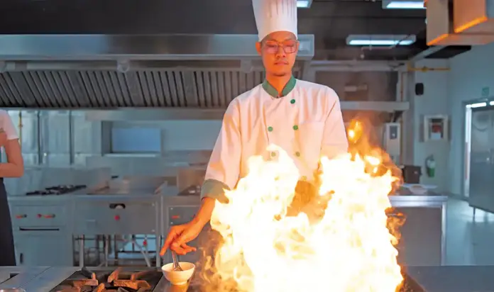 legally protected absences chef kitchen flambe fire