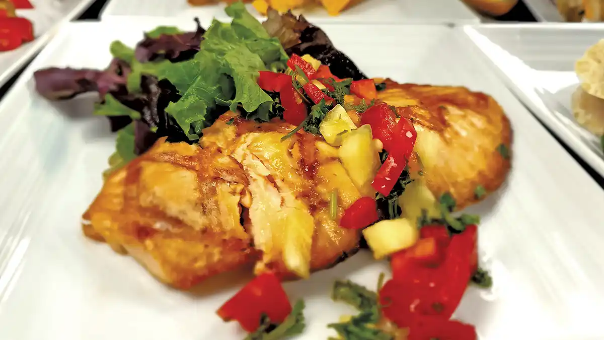 Perfectly cooked to order: Grilled chicken with pineapple salsa fresh out of the iCombi Pro (below)