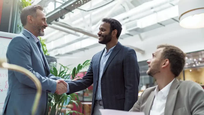 Prioritizing The Customer Experience business partnership handshake