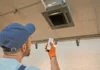 worker clean air conditioner restaurant