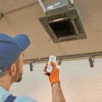 worker clean air conditioner restaurant