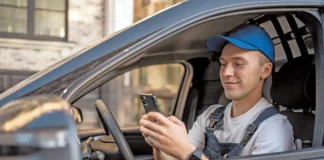 delivery courier car driving and texting